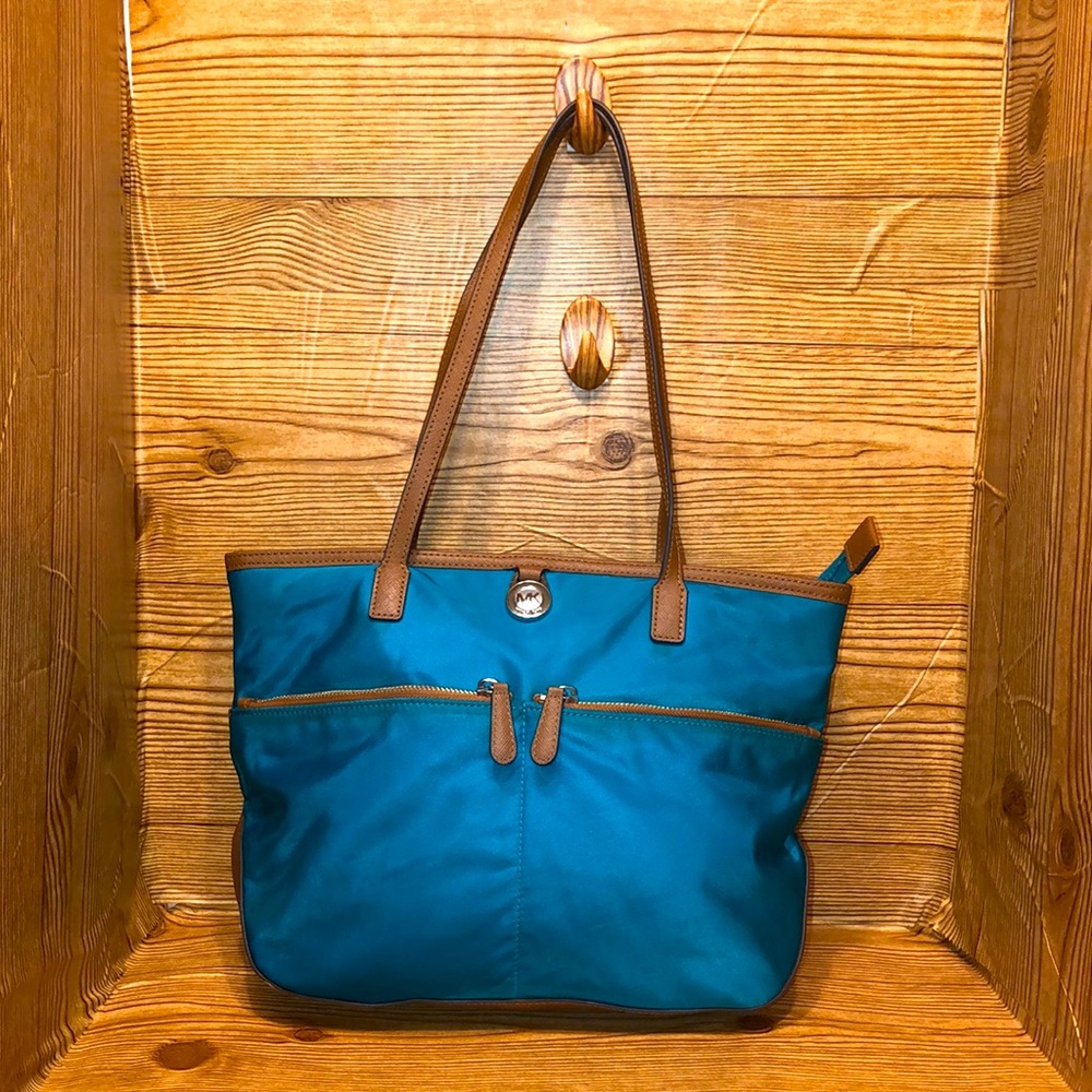 Michael Kors Turquoise Nylon Bag. Carried only a few .Easy, lightweight purse.
